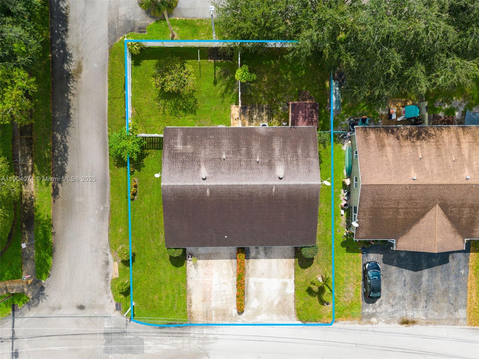 6510 Southwest 49th Street Davie, FL 33314 - Photo 24 of 26 an aerial view of a house with garden space and street view