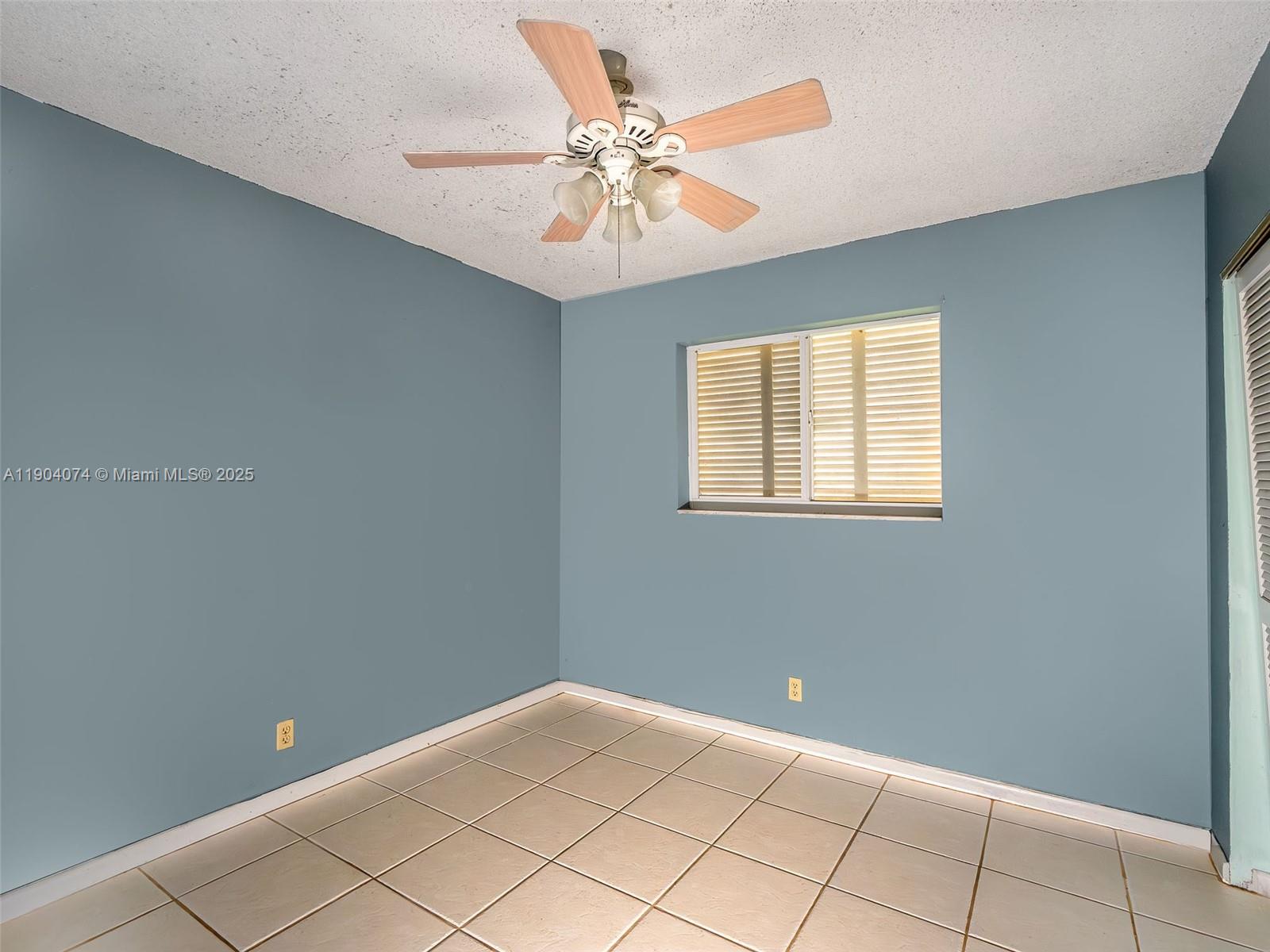 6510 Southwest 49th Street Davie, FL 33314 - Photo 9 of 26 a view of an empty room with a window