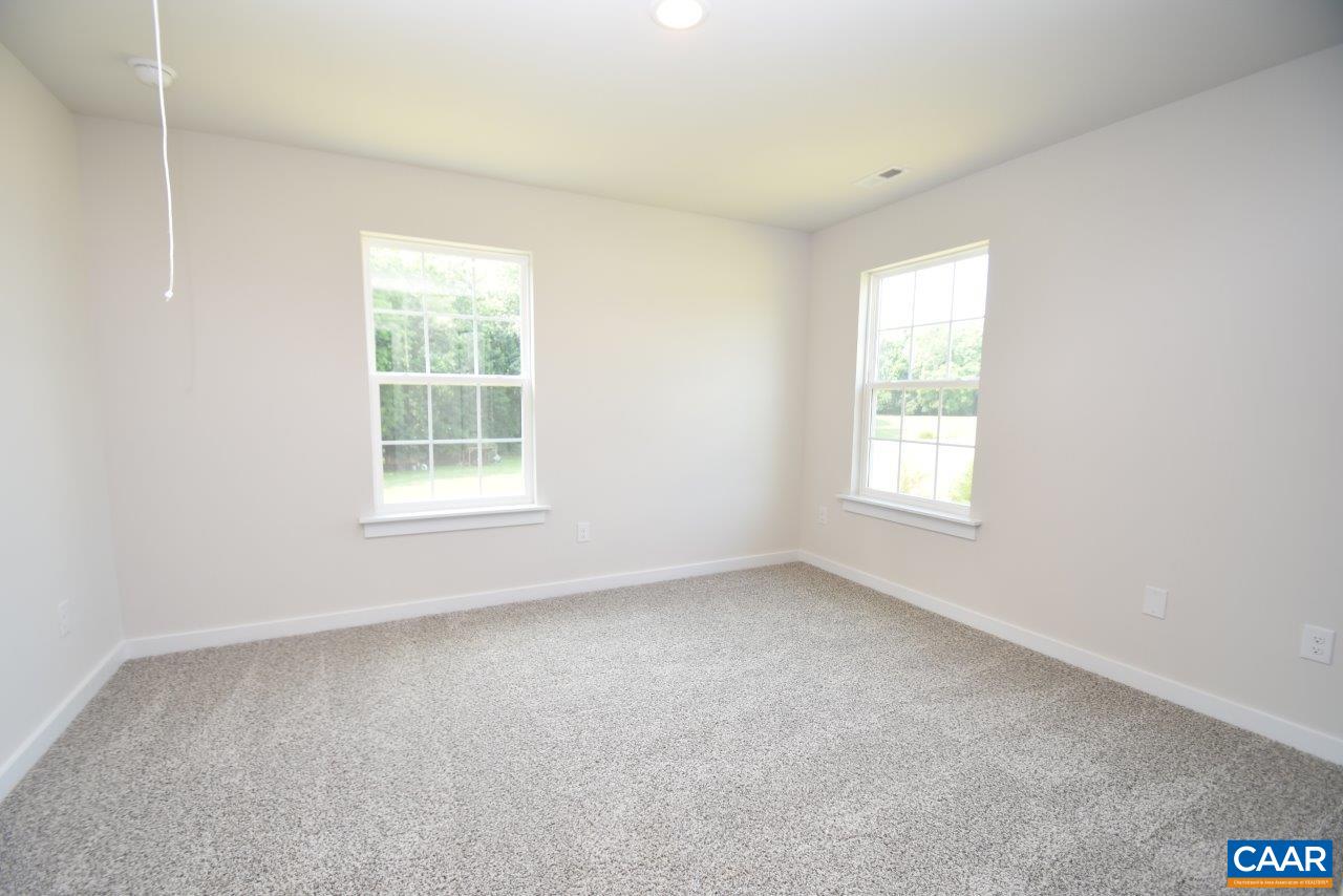 11675 Jack Jouett Road West Zion Crossroads, VA 22942 - Photo 12 of 33 an empty room with a window