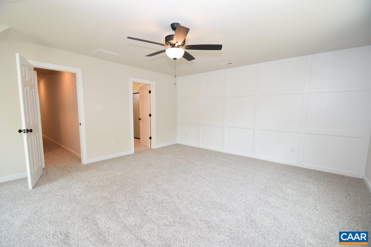 11675 Jack Jouett Road West Zion Crossroads, VA 22942 - Photo 21 of 33 wooden floor in an empty room