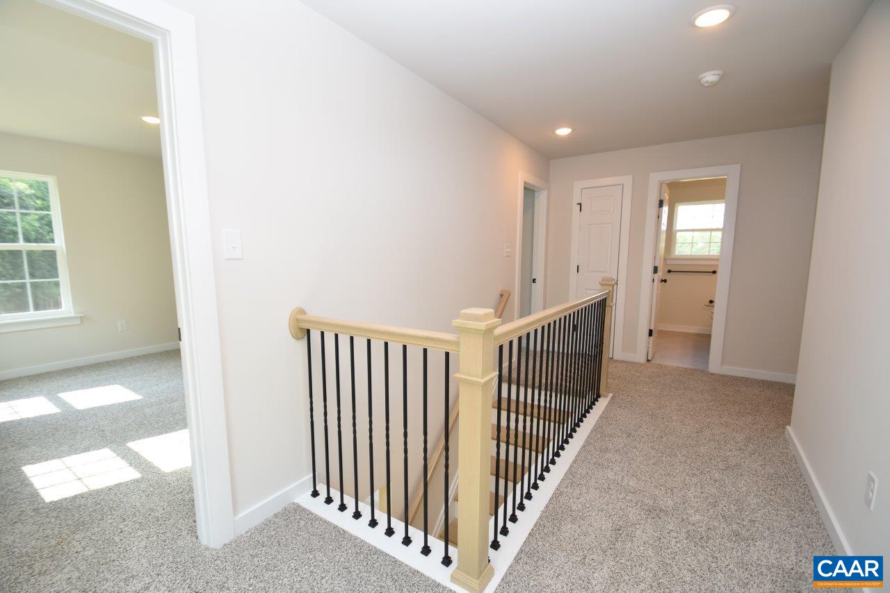 11675 Jack Jouett Road West Zion Crossroads, VA 22942 - Photo 21 of 32 a view of a hallway with windows