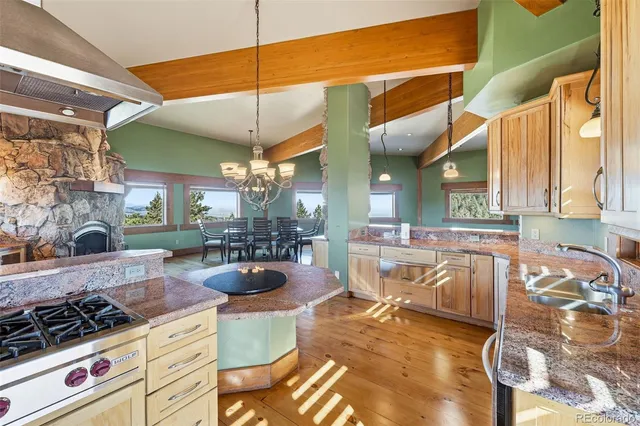 a view of balcony with wooden floor and ocean view