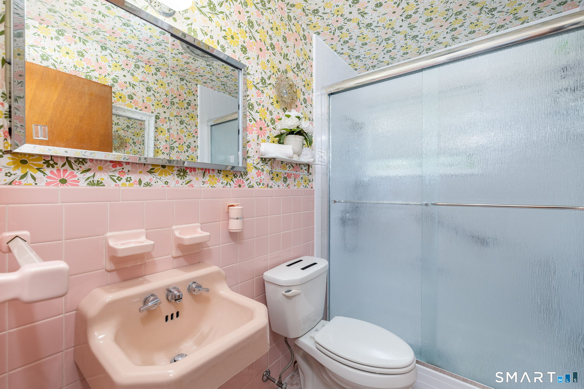 325 Barbara Road Middletown, CT 06457 - Photo 20 of 40 a bathroom with a sink a toilet and a mirror