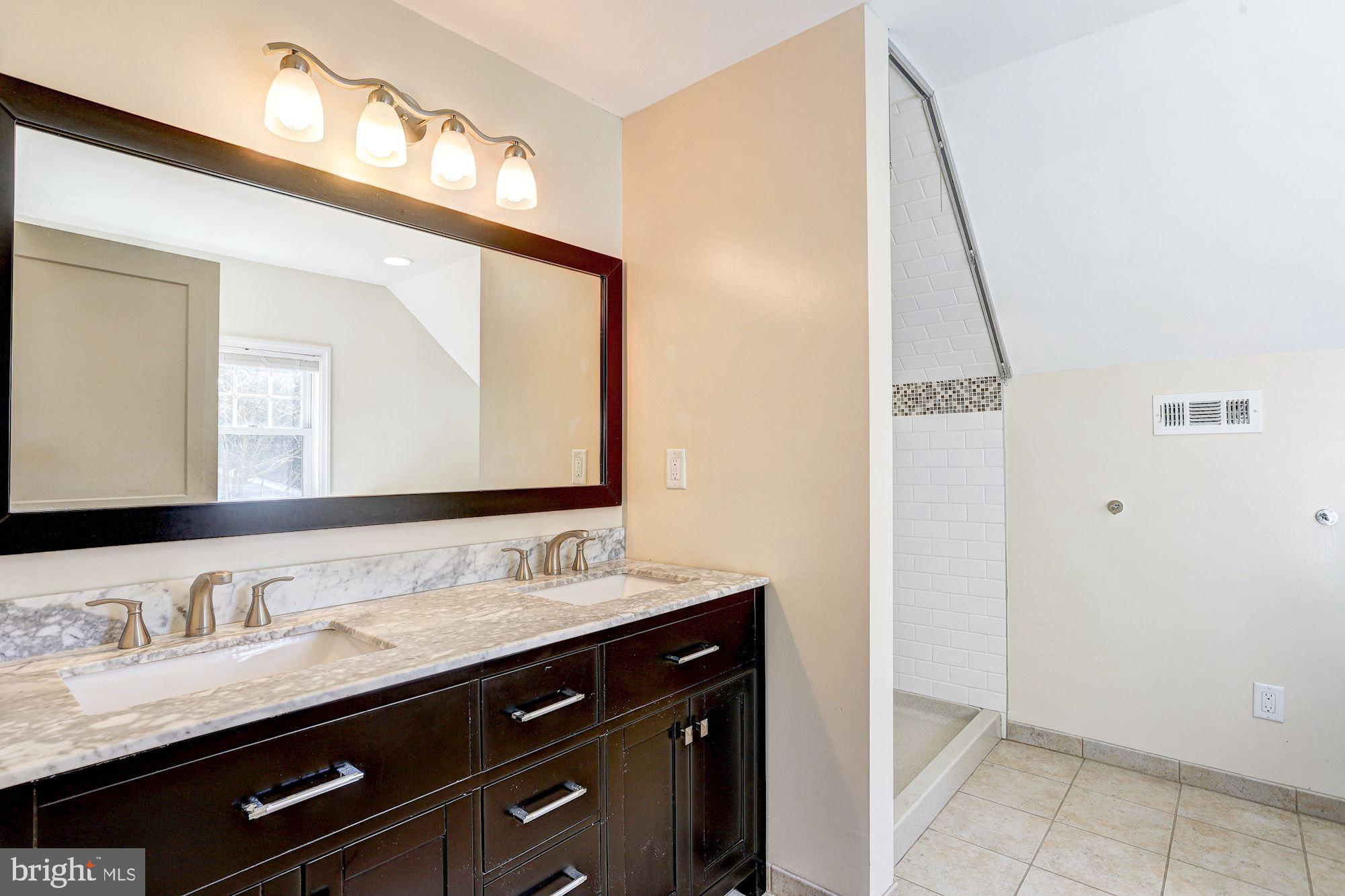 5522 Montgomery Road Ellicott City, MD 21043 - Photo 25 of 42 Primary Suite Bathroom