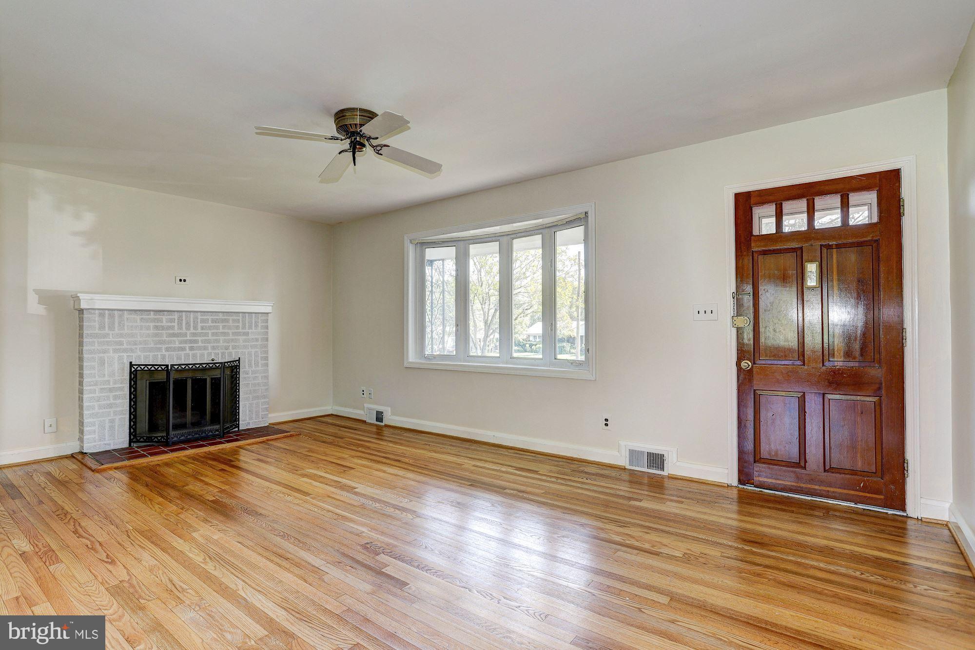 5522 Montgomery Road Ellicott City, MD 21043 - Photo 5 of 42 Living Room with Bay Window