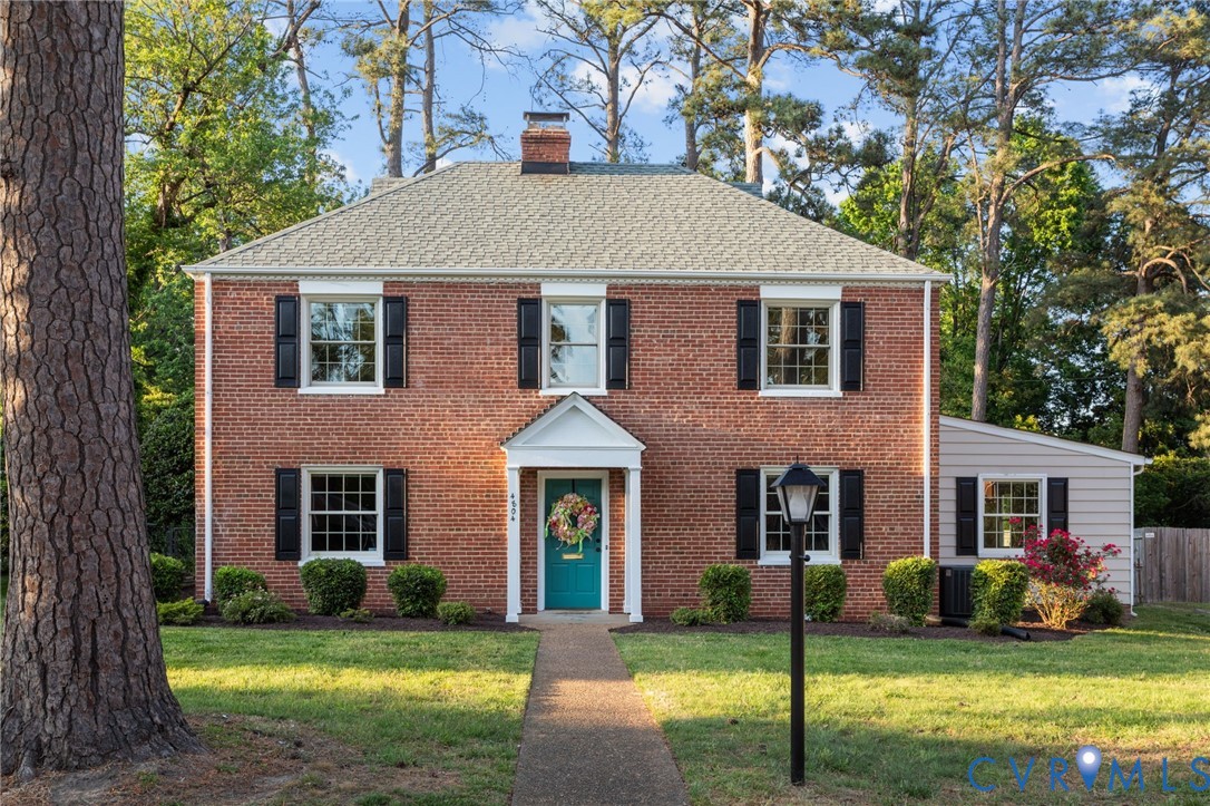 4804 Morrison Road Richmond, VA 23230 - Photo 4 of 48 a front view of a house with garden and porch