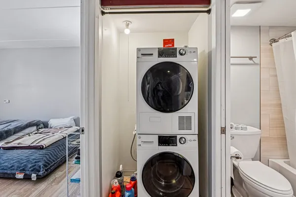 a utility room with dryer and washer