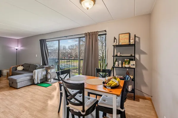 a kitchen with stainless steel appliances granite countertop a refrigerator and a stove