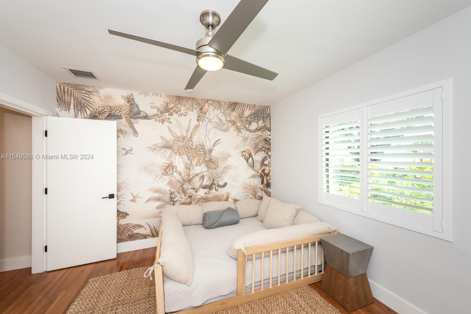 520 Southwest 27th Road Miami, FL 33129 - Photo 23 of 50 a living room with furniture and a window