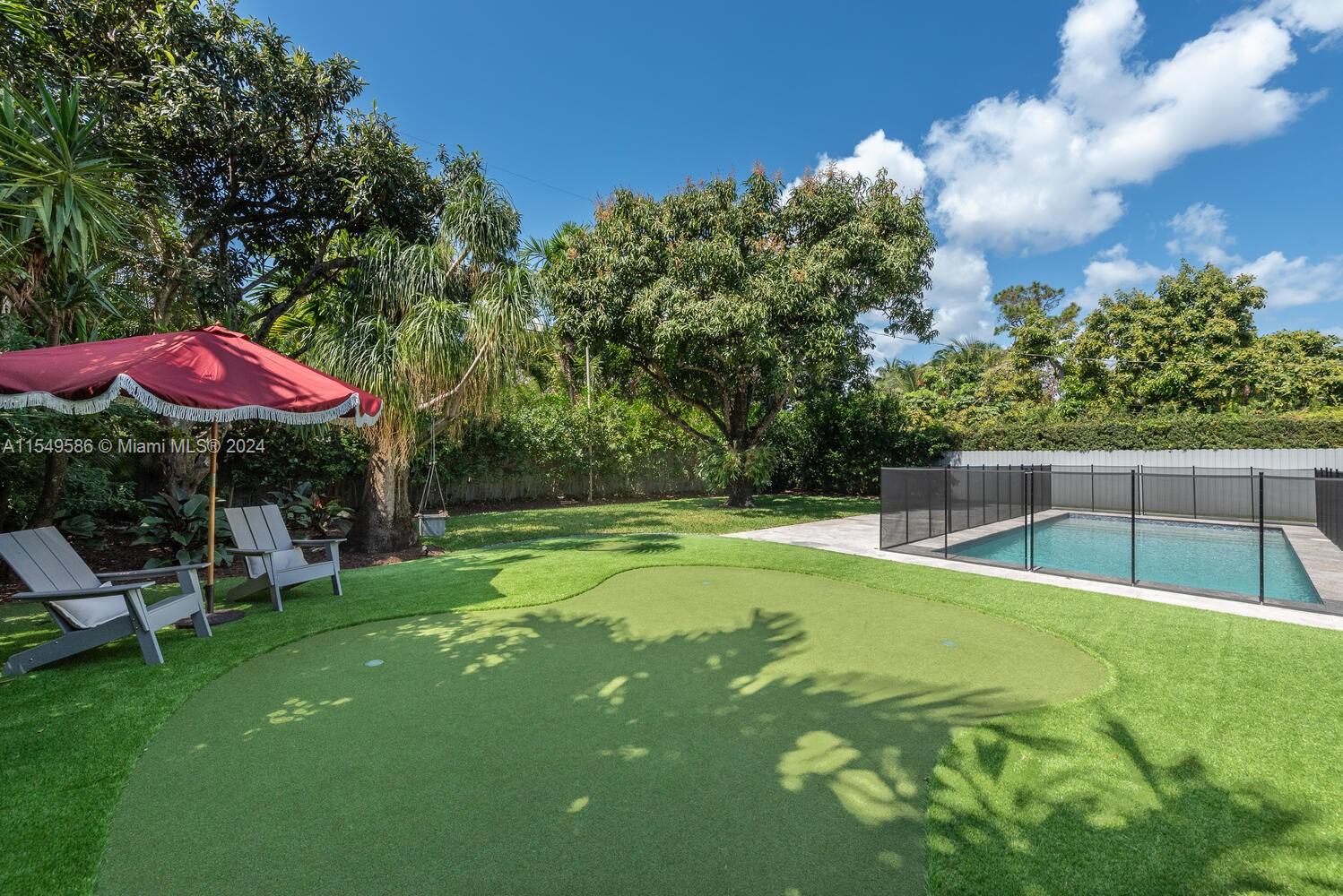 520 Southwest 27th Road Miami, FL 33129 - Photo 3 of 50 a view of a backyard with swimming pool