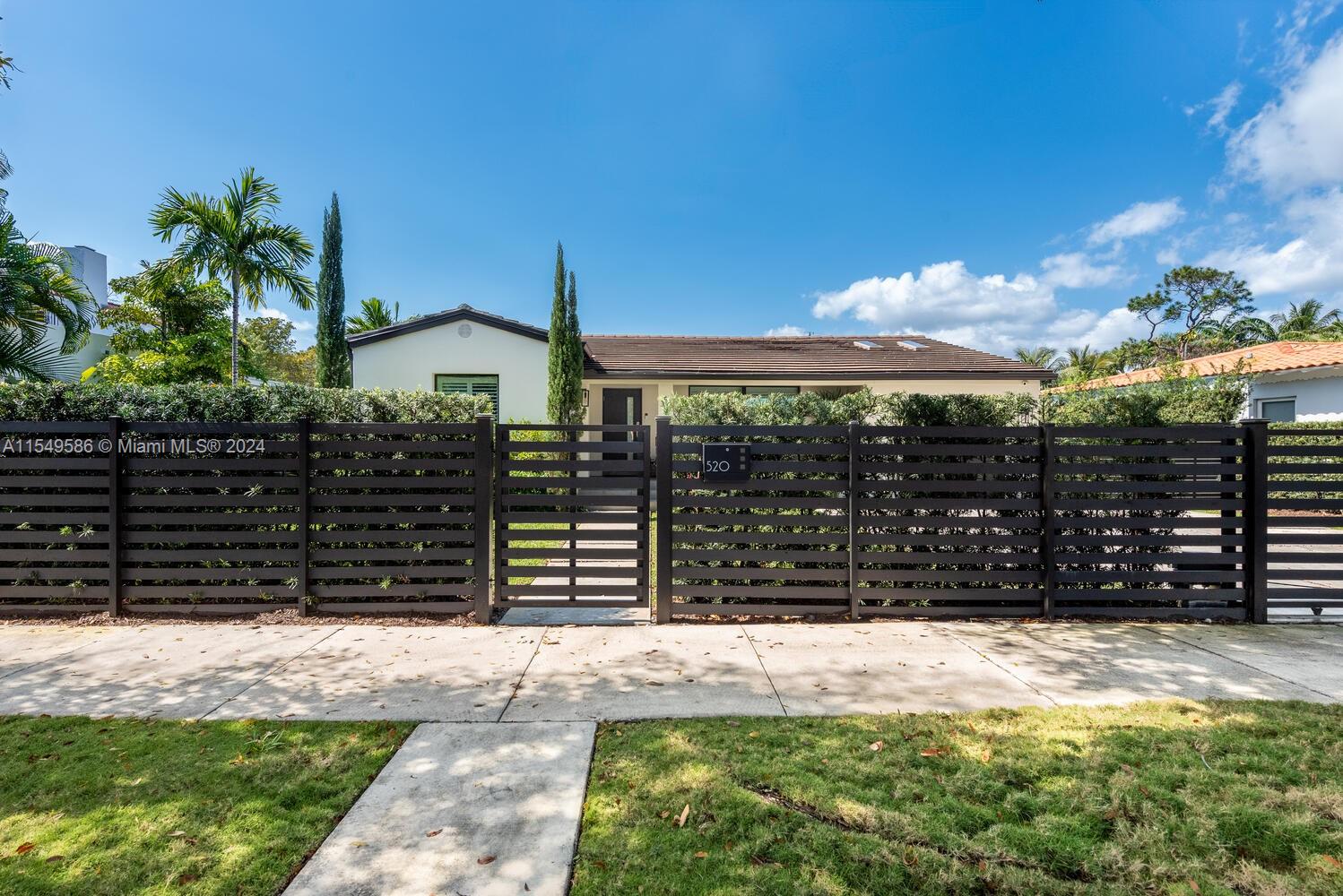 520 Southwest 27th Road Miami, FL 33129 - Photo 40 of 50 a view of a house with a yard