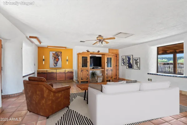 a view of a storage & utility room with dryer and washer