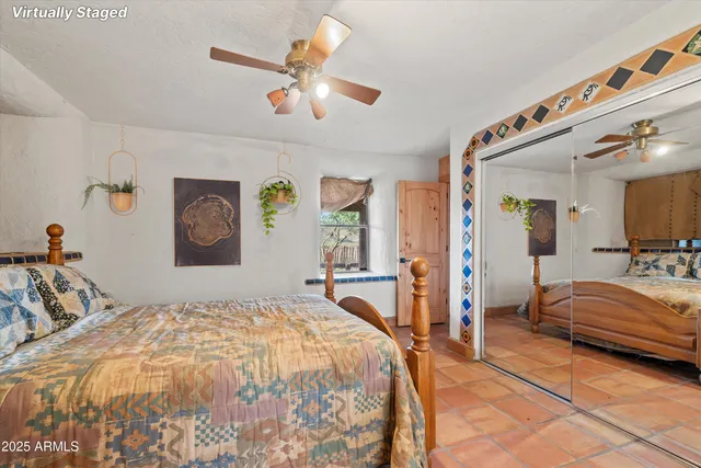 an aerial view of a house with a garden