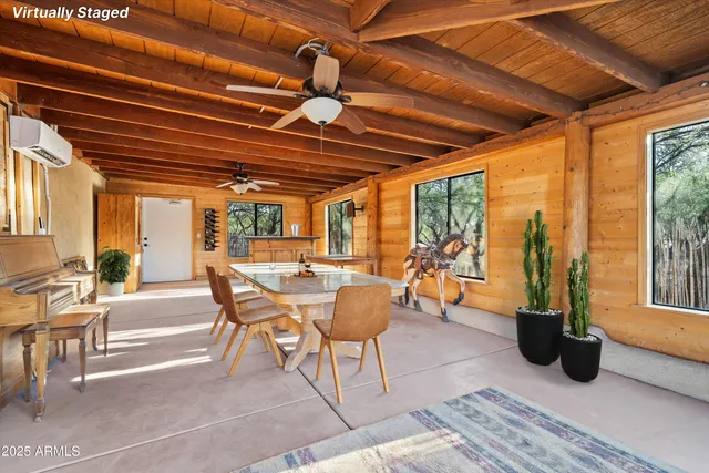 a view of a house with backyard