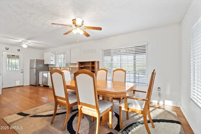 a view of a town with mountains in the background