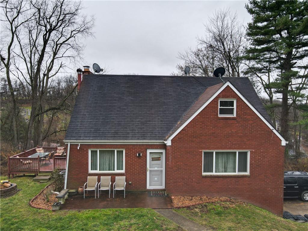 131 8th Avenue West Mifflin, PA 15122 - Photo 1 of 36 a backyard of a house with seating space