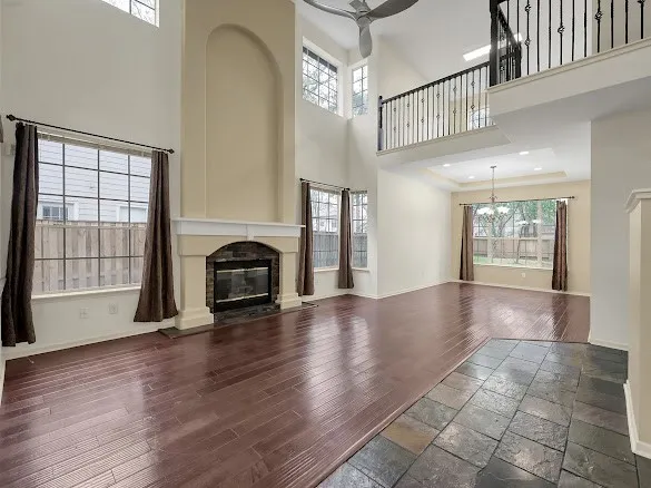 a view of livingroom with hardwood floor and a ceiling fan