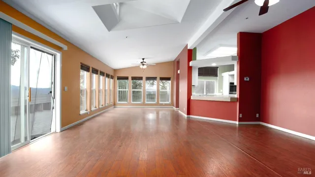 a kitchen with sink and refrigerator