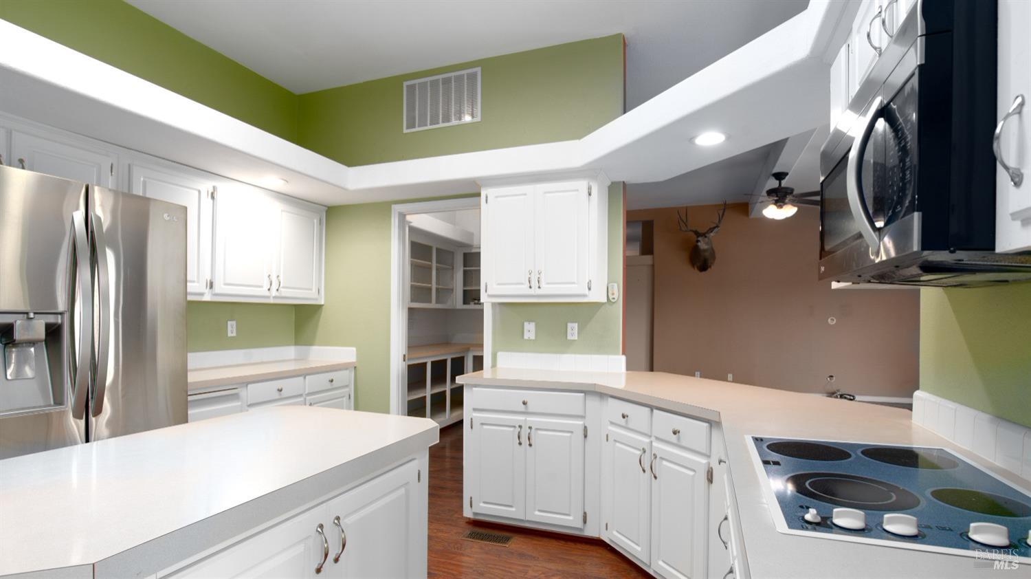 505 McNair Road Cloverdale, CA 95425 - Photo 16 of 55 a kitchen with a sink stainless steel appliances and cabinets