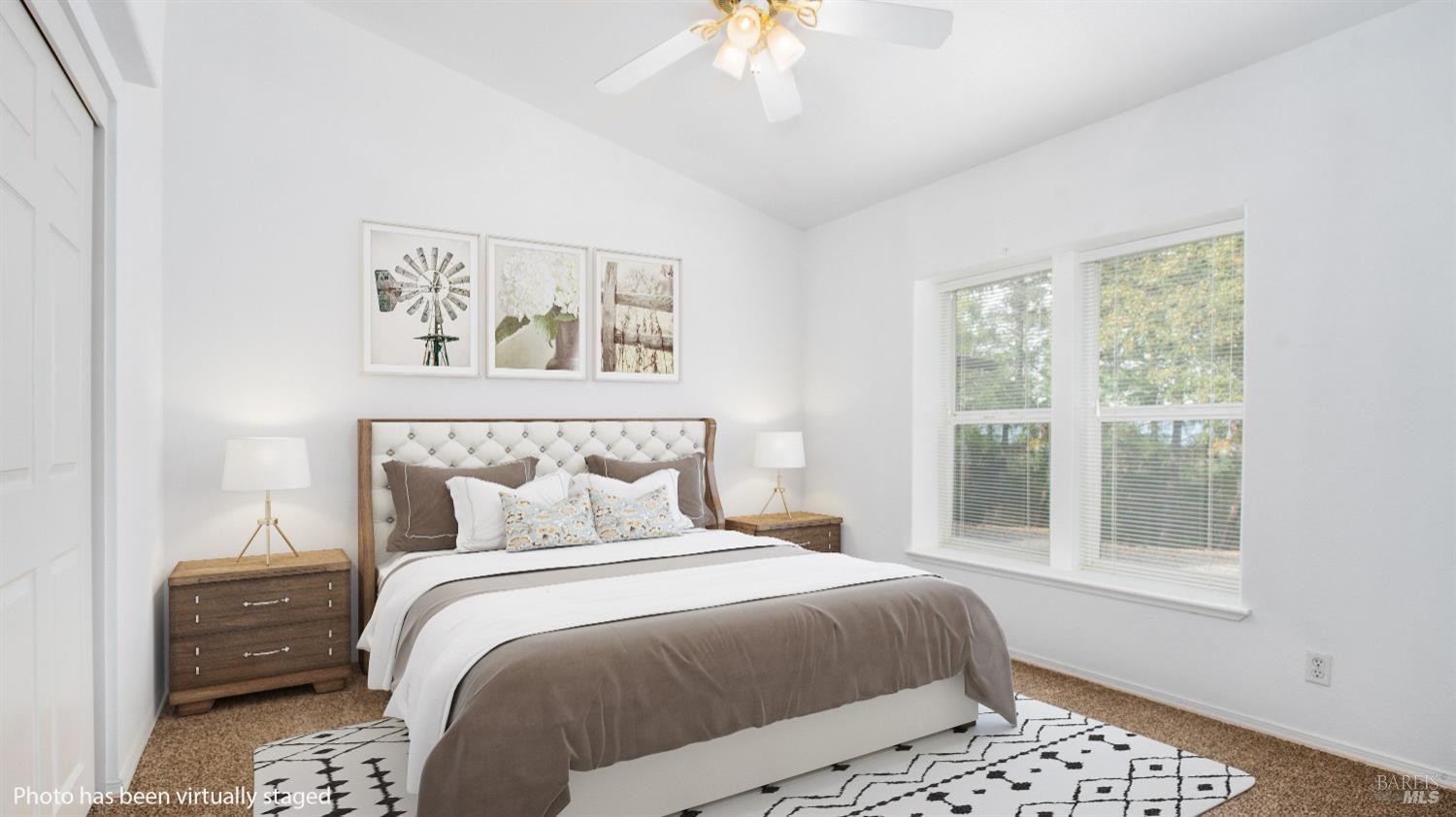 505 McNair Road Cloverdale, CA 95425 - Photo 36 of 58 a bedroom with a bed and a painting on the wall