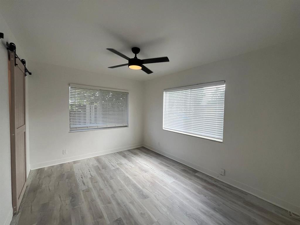 1712 Fletcher Street, Unit 5 Hollywood, FL 33020 - Photo 3 of 11 a view of an empty room with a window