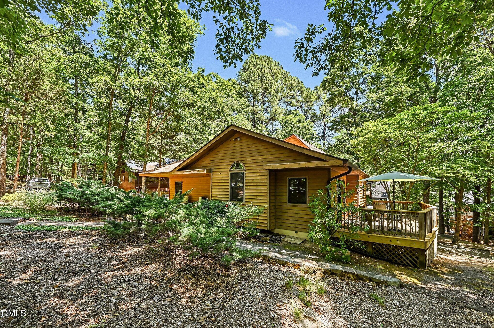 200 Spring Valley Road Carrboro, NC 27510 - Photo 6 of 38 a house view with a outdoor space