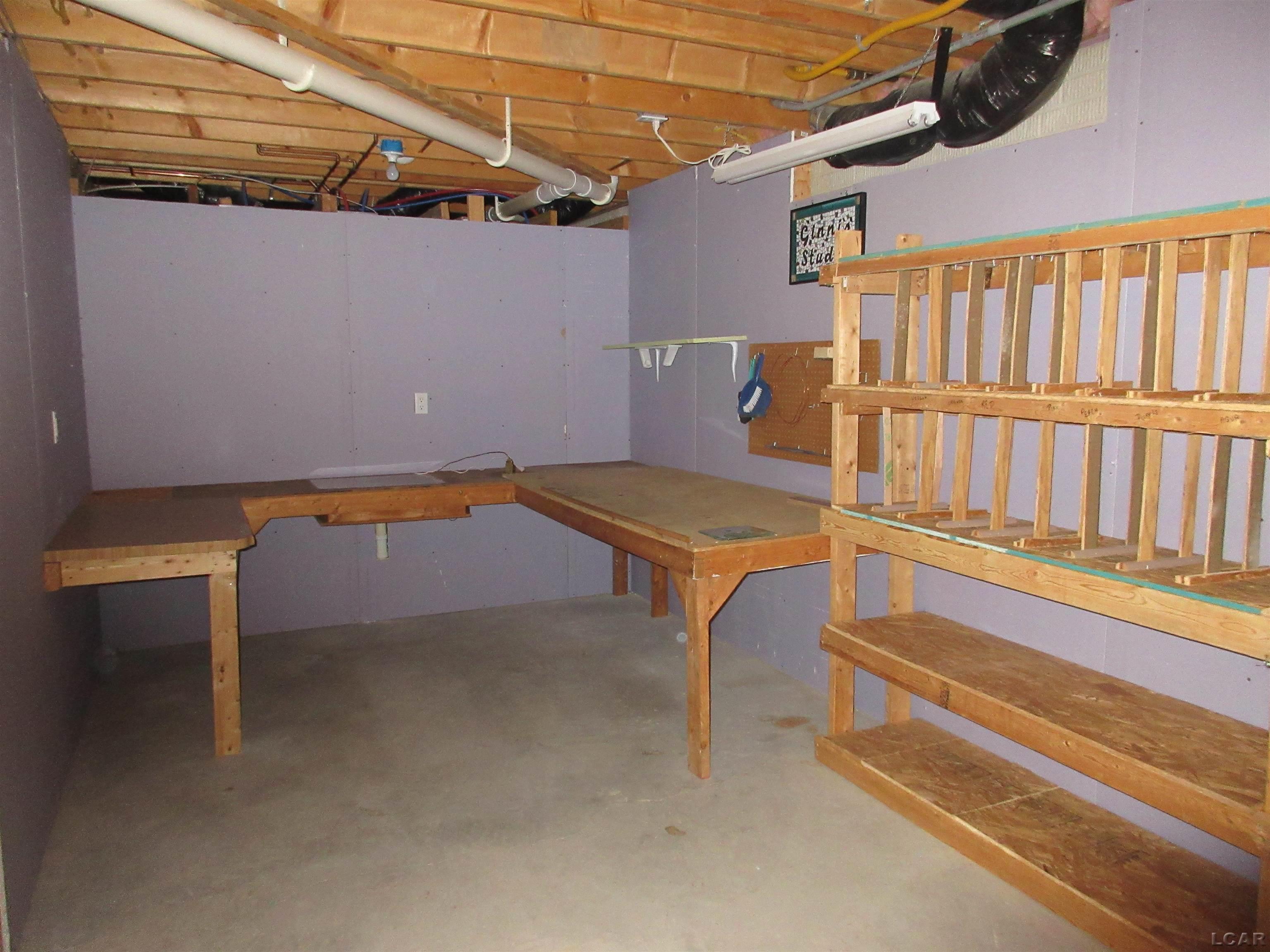 673 Ridge Lane Tecumseh, MI 49286 - Photo 51 of 62 Basement Craft Area