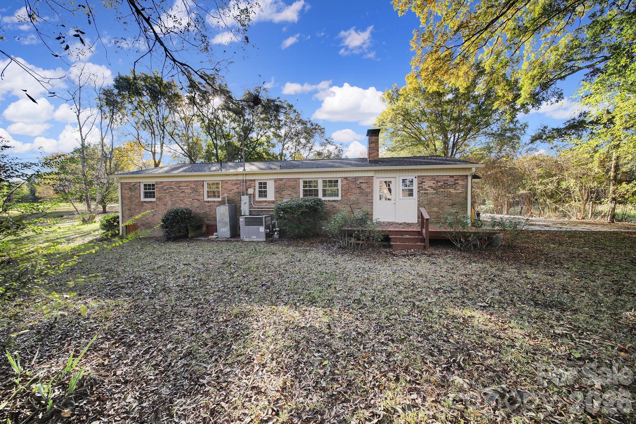 3987 Taxahaw Road Lancaster, SC 29720 - Photo 28 of 28 front view of a house with a yard