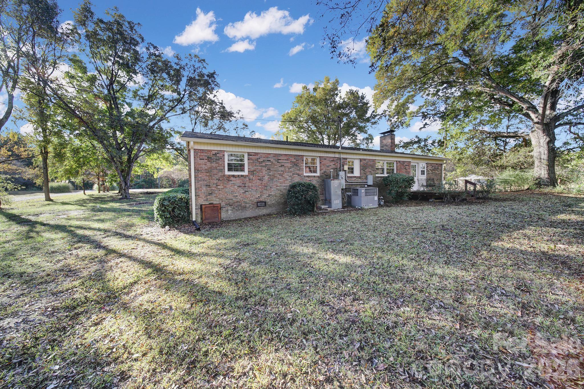 3987 Taxahaw Road Lancaster, SC 29720 - Photo 3 of 28 a view of a house with a back yard