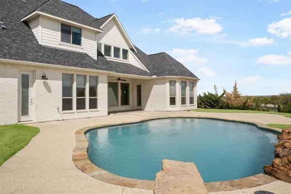 a view of a house with pool