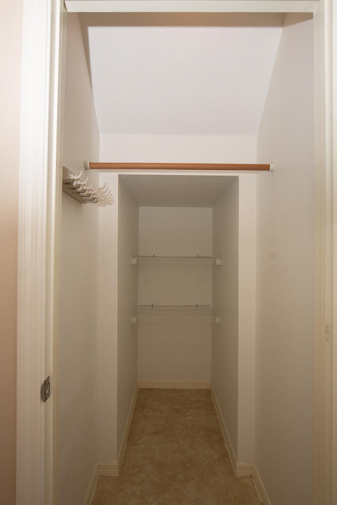 117 Coconut Key Lane Delray Beach, FL 33484 - Photo 15 of 20 Under Stair Closet
