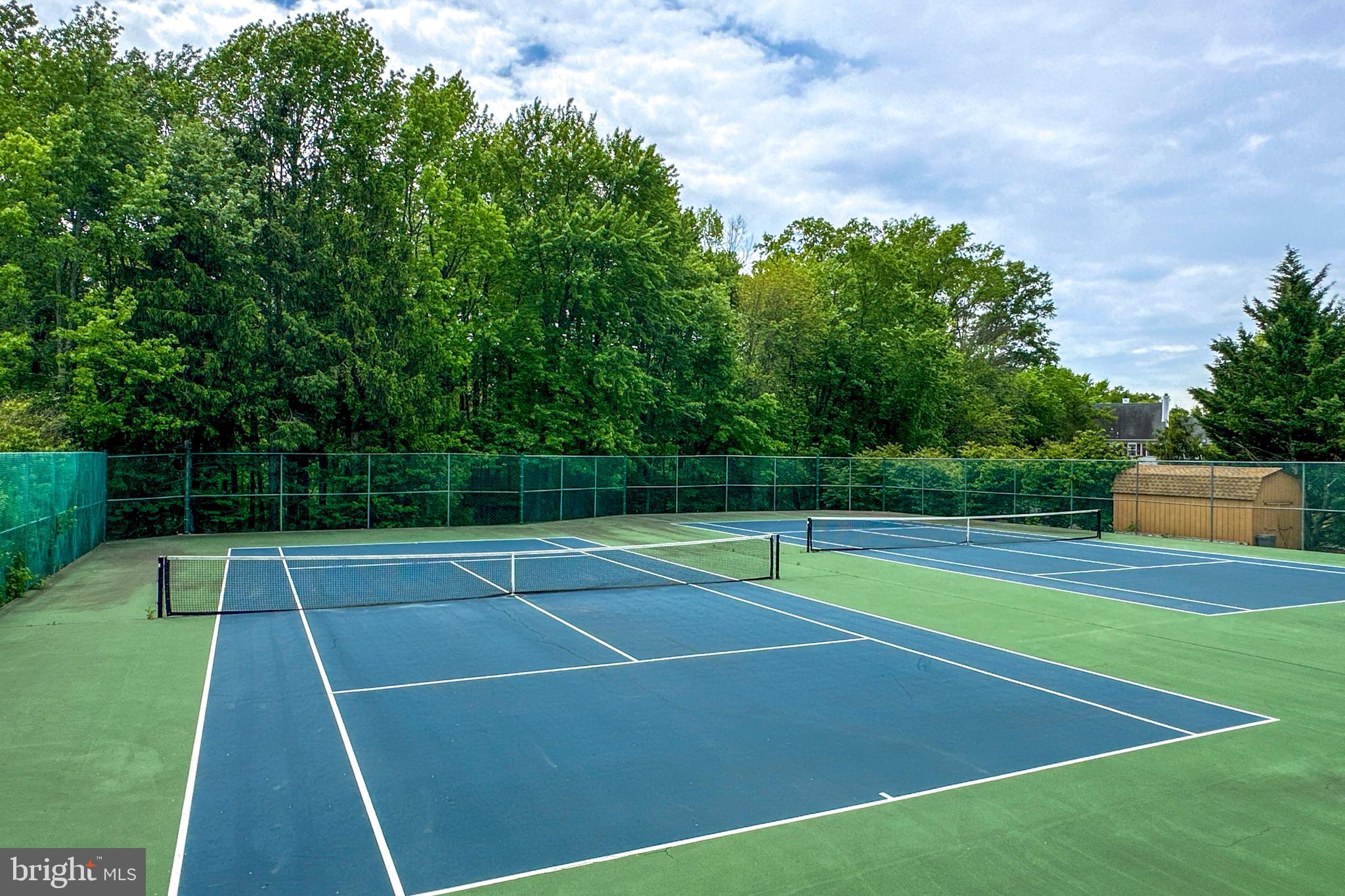 24 Foster Road Pennington, NJ 08534 - Photo 37 of 38 a view of an outdoor space and tennis court