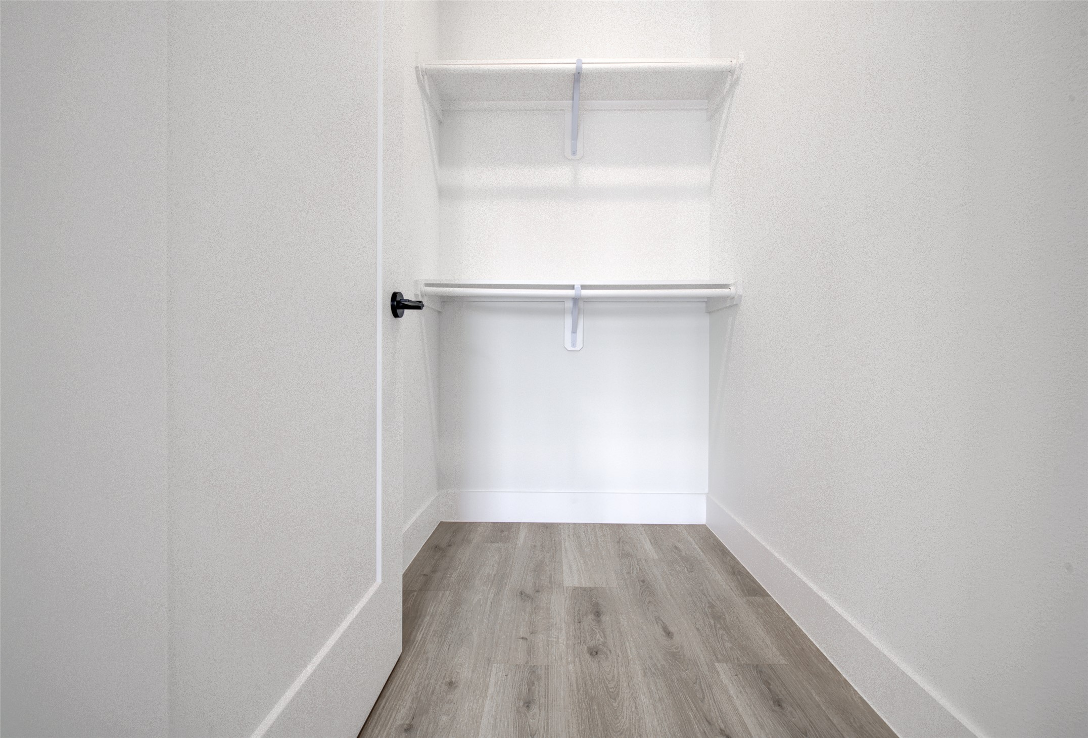 1701 Simond Avenue, Unit 229 Austin, TX 78723 - Photo 13 of 20 a view of a small space with wooden floor