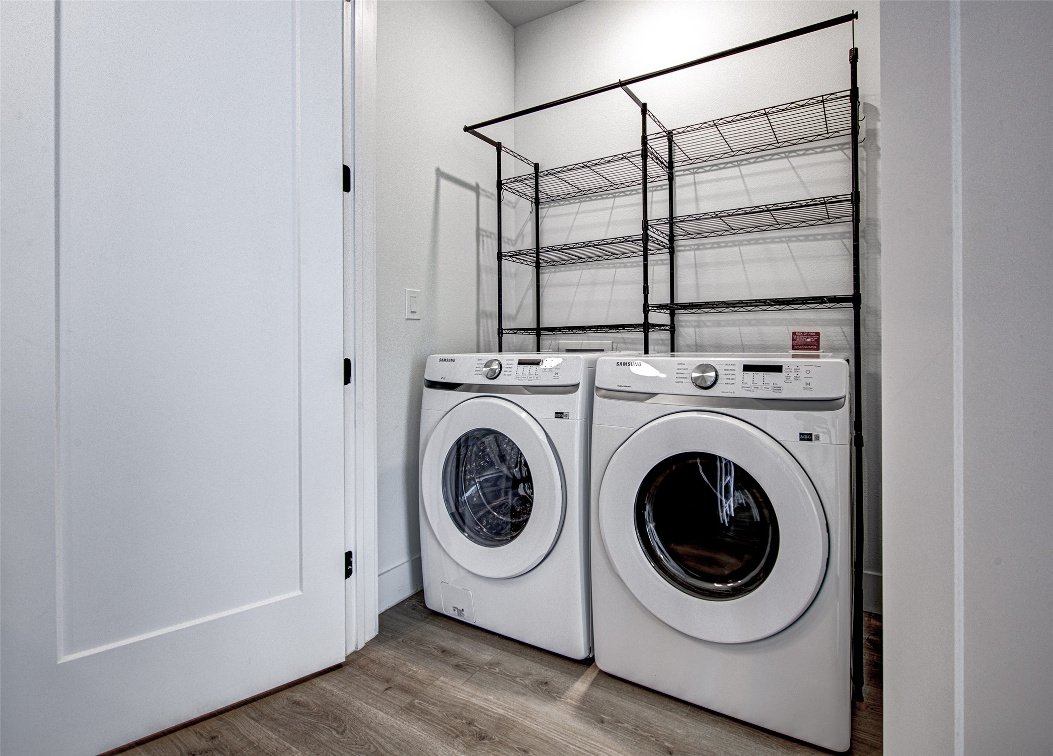 1701 Simond Avenue, Unit 229 Austin, TX 78723 - Photo 17 of 20 a utility room with dryer and washer
