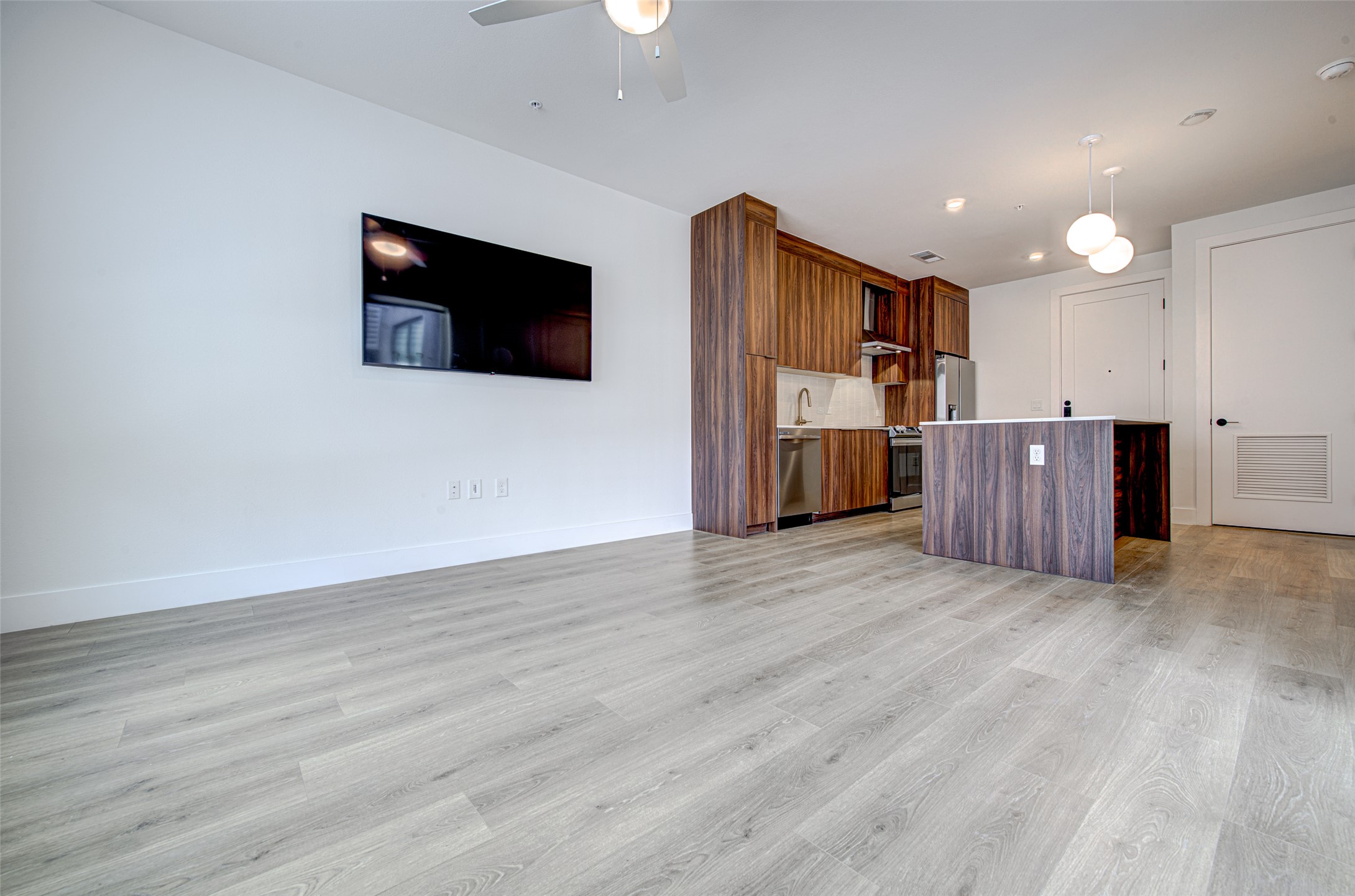 1701 Simond Avenue, Unit 229 Austin, TX 78723 - Photo 20 of 20 a view of kitchen and wooden floor