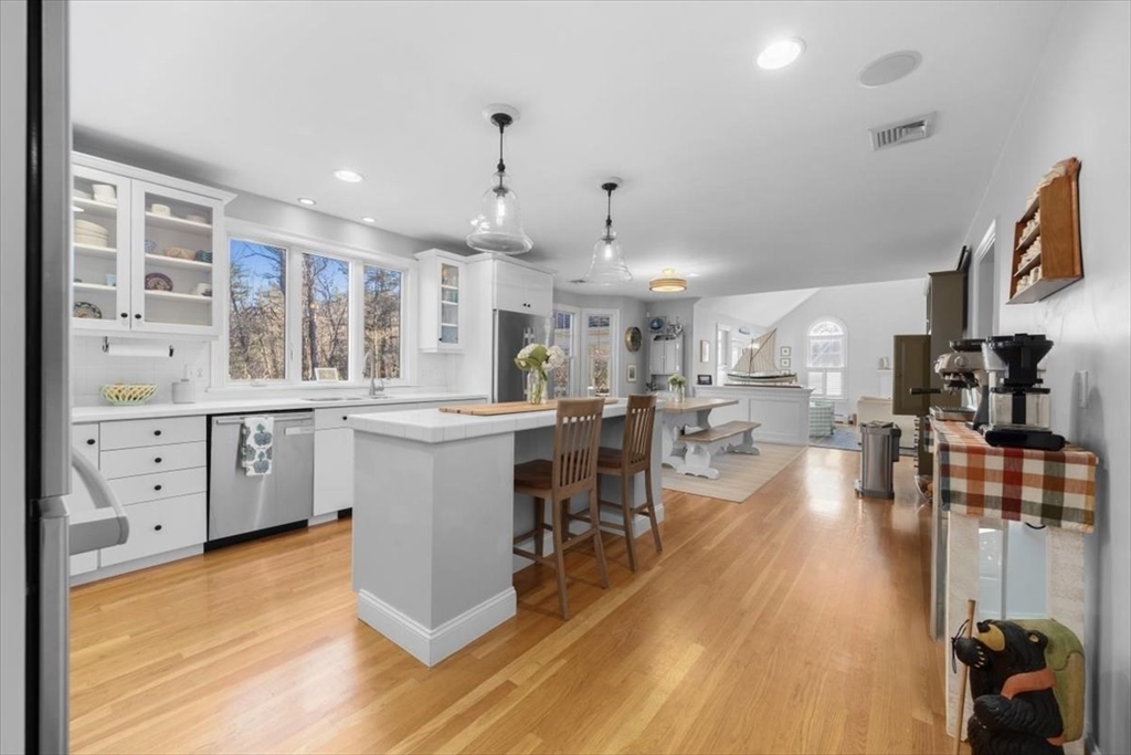 125 Maple Street Scituate, MA 02066 - Photo 6 of 42 a kitchen with a sink appliances and cabinets