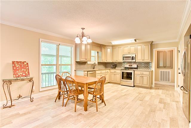 727 Lewter Hollow Road Ardmore, TN 38449 - Photo 6 of 20 a view of a dining room with furniture and wooden floor