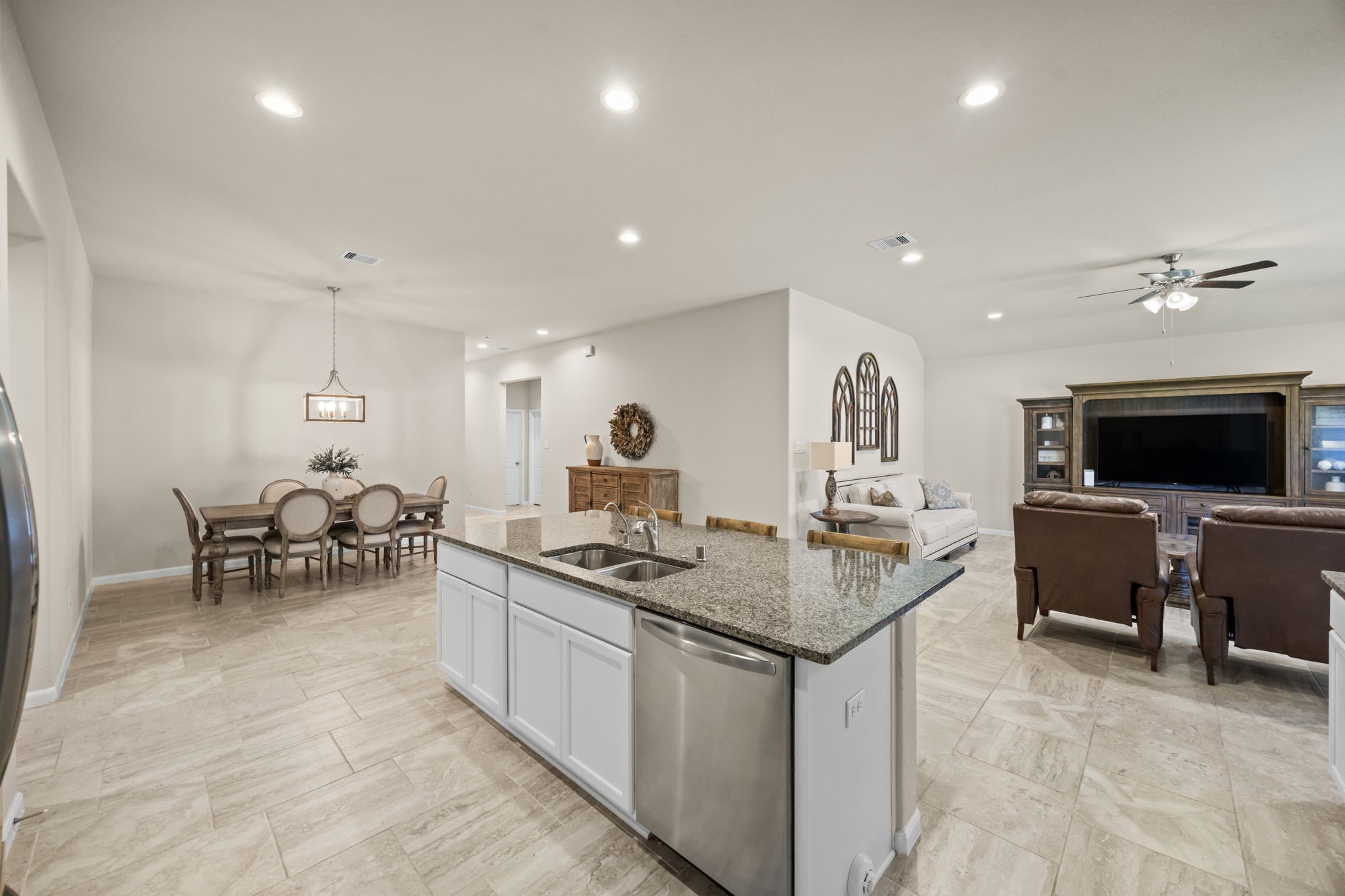 519 Yellow Bullhead Court Rosenberg, TX 77469 - Photo 23 of 24 Another view of the spacious open floor plan where guests can gather for seamless interaction while entertaining. Hosting holiday gatherings will be a breeze in this incredible home.