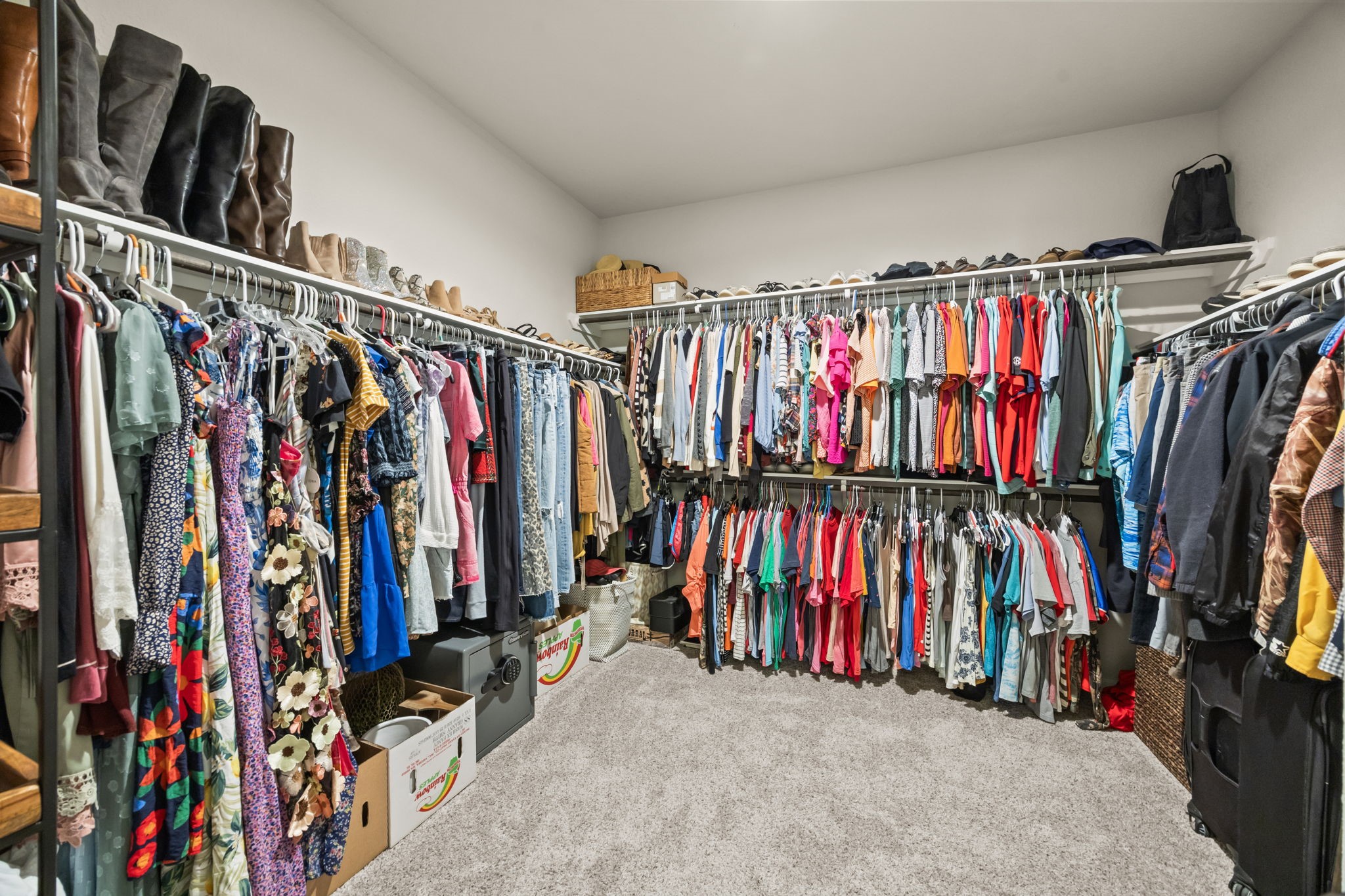 519 Yellow Bullhead Court Rosenberg, TX 77469 - Photo 16 of 24 Check out the size of the primary closet. Ample room to accommodate all your wardrobe needs.