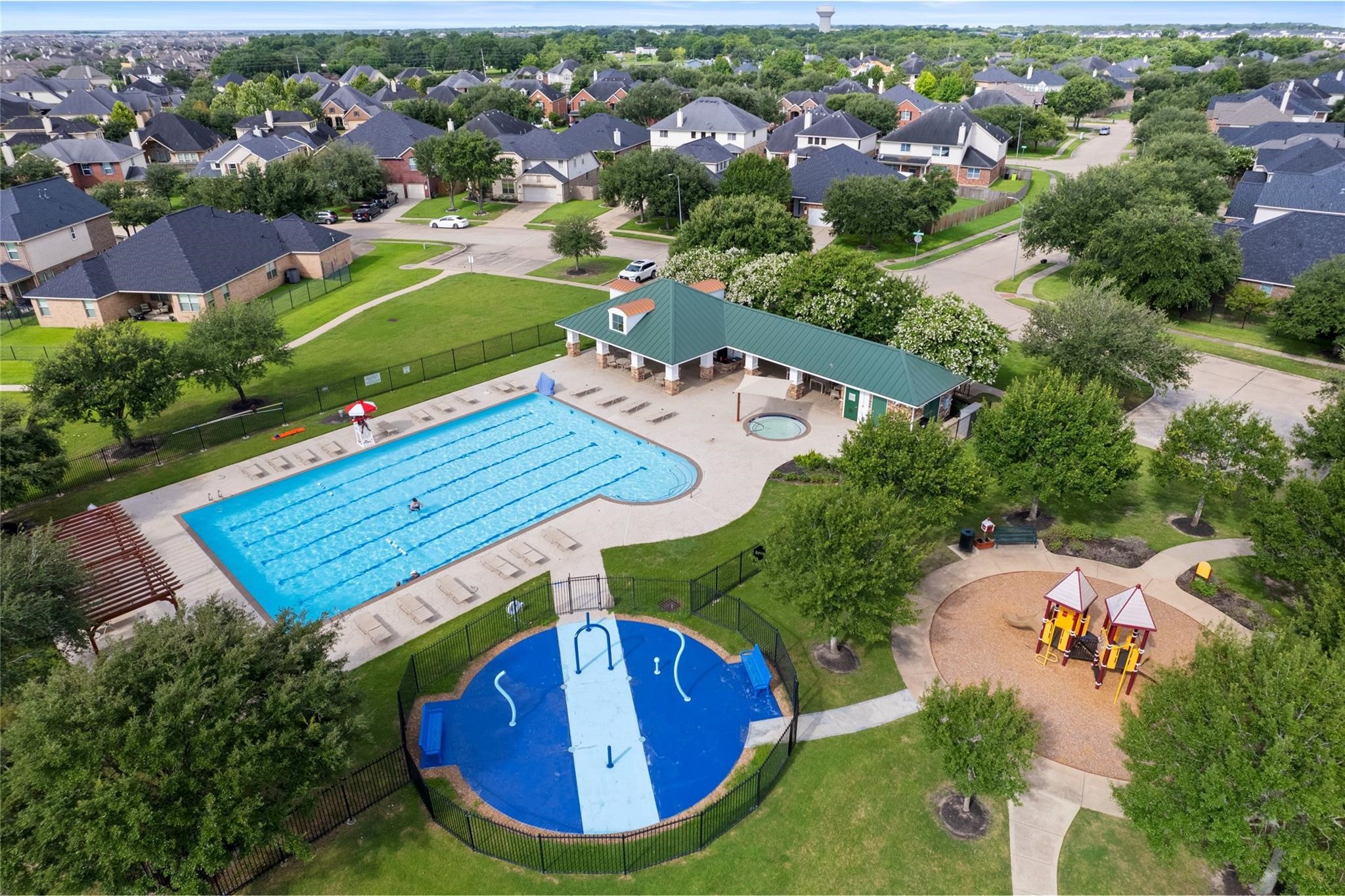519 Yellow Bullhead Court Rosenberg, TX 77469 - Photo 19 of 24 Community amenities include a resort style pool, large splash pad and clubhouse. Multiple playgrounds, parks and lakes.