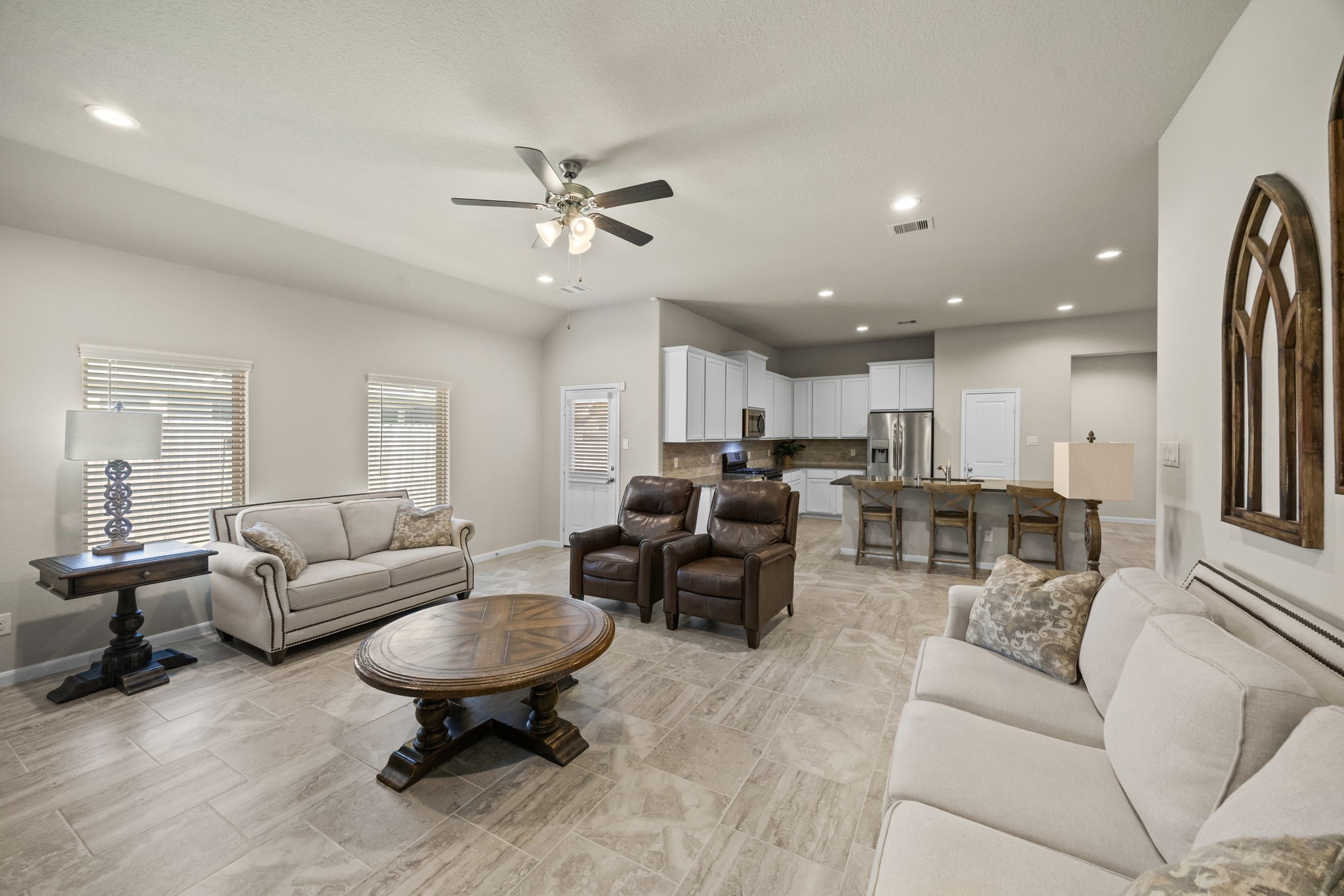 519 Yellow Bullhead Court Rosenberg, TX 77469 - Photo 22 of 24 The spacious great room provides the perfect place for your family to spend time together! You will love the open concept floor plan that allows for seamless interaction between family and guests in the integrated kitchen, dining, and living areas that flow into each other.