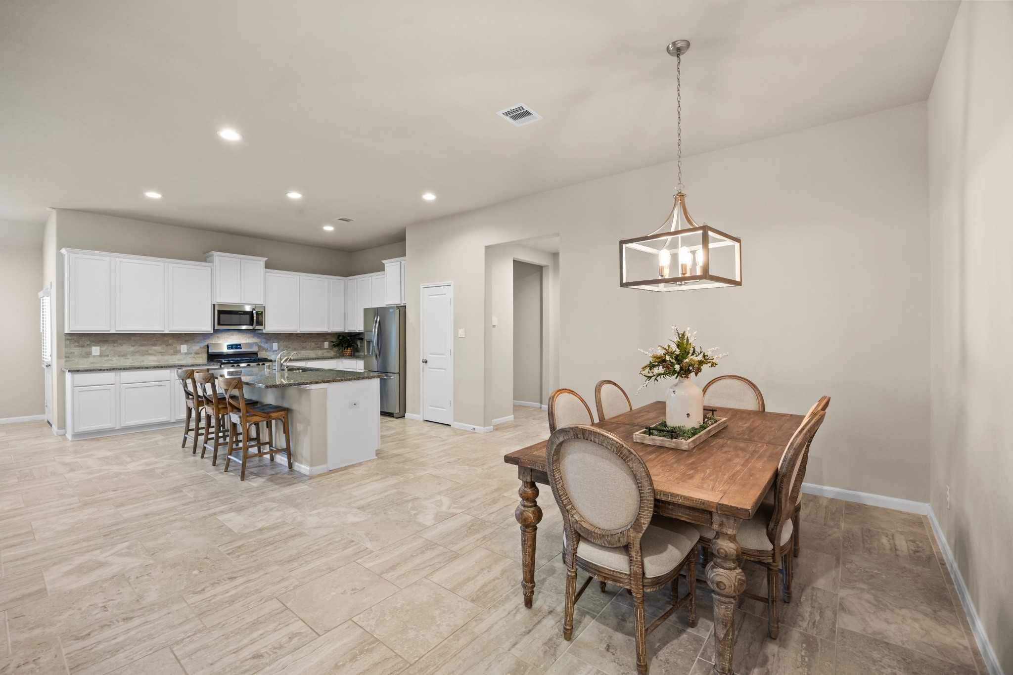 519 Yellow Bullhead Court Rosenberg, TX 77469 - Photo 9 of 24 This spacious dining area will accommodate the largest of dining tables with ample room for side pieces. Your home will be the gathering place of family and friends.