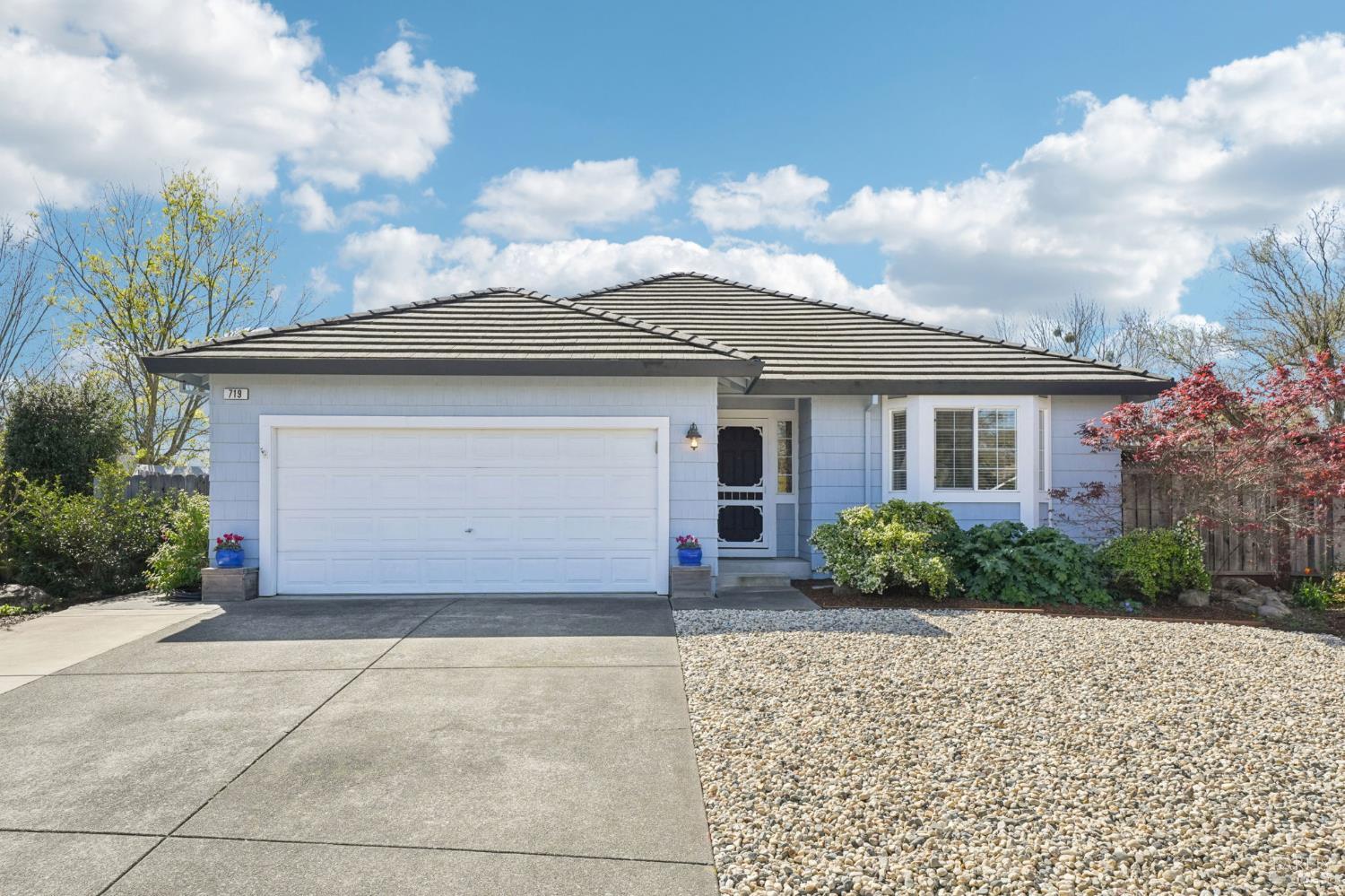 719 Hackberry Court Windsor, CA 95492 - Photo 1 of 1 a front view of a house with a garden