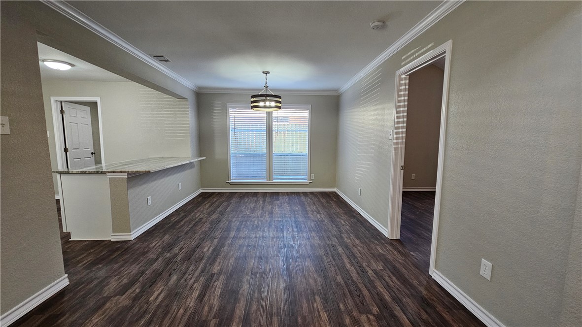 2438 Scotch Moss Drive Corpus Christi, TX 78414 - Photo 12 of 34 a view of empty room with wooden floor and fan