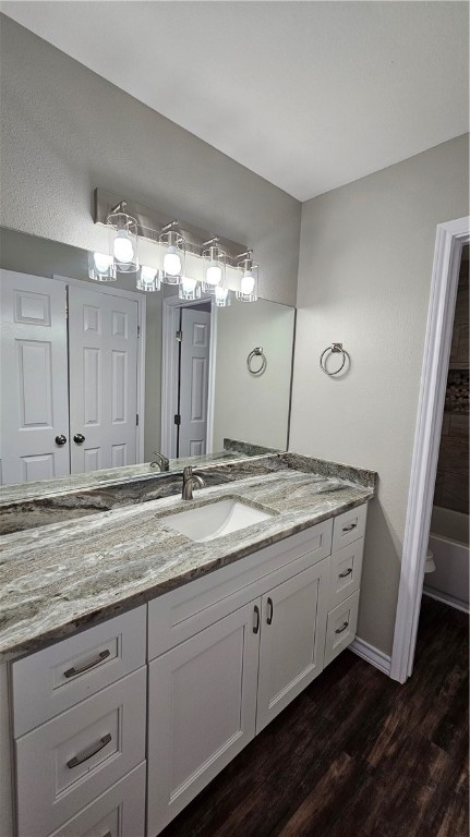 2438 Scotch Moss Drive Corpus Christi, TX 78414 - Photo 26 of 34 a bathroom with a granite countertop sink and a mirror