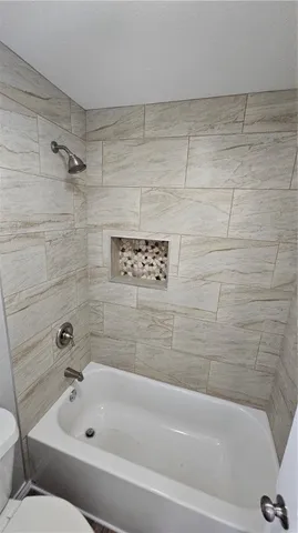 a bathroom with a bathtub