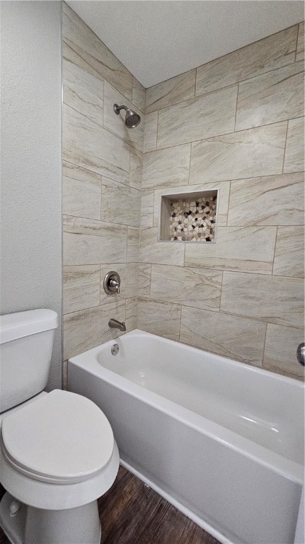 2438 Scotch Moss Drive Corpus Christi, TX 78414 - Photo 28 of 34 a bathroom with a toilet and a bathtub