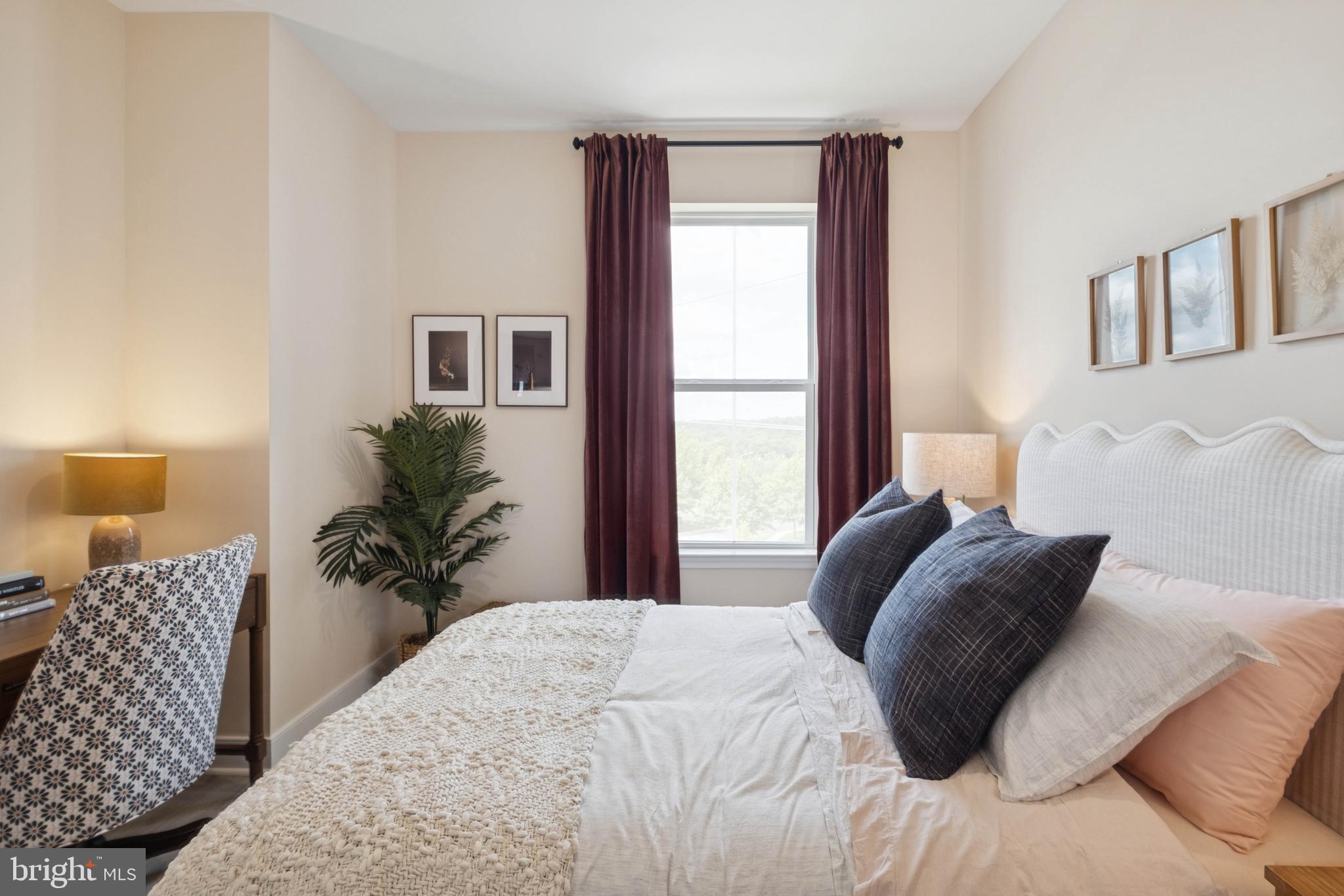 14962 Deco Circle Chantilly, VA 20151 - Photo 18 of 53 a bedroom with a large bed and a window