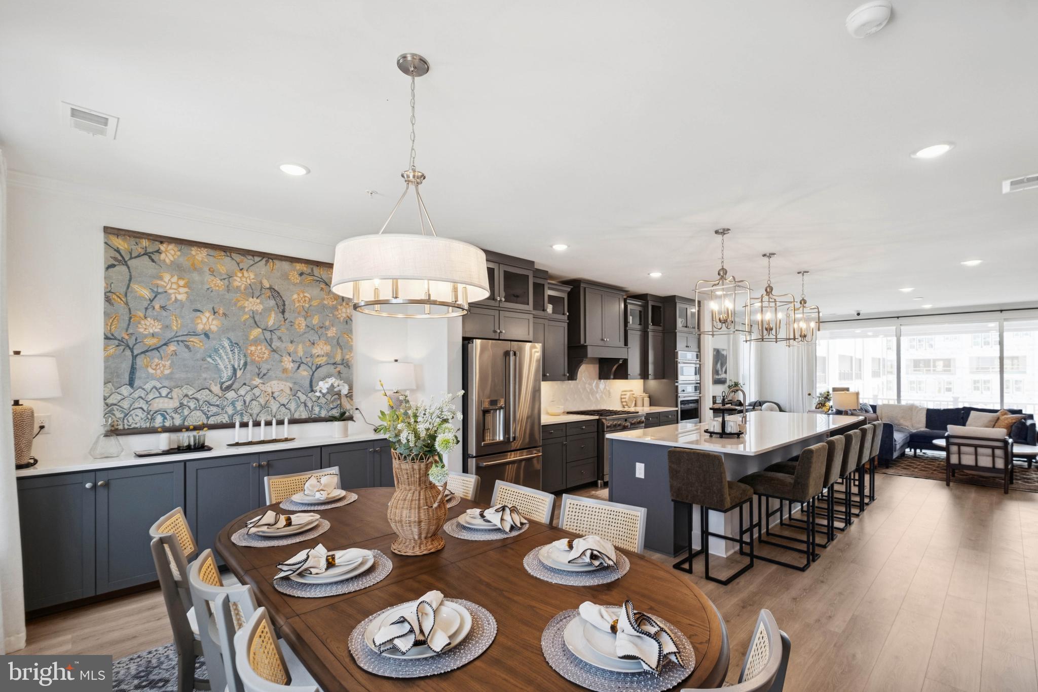 14962 Deco Circle Chantilly, VA 20151 - Photo 47 of 53 a view of a dining room with furniture wooden floor and chandelier