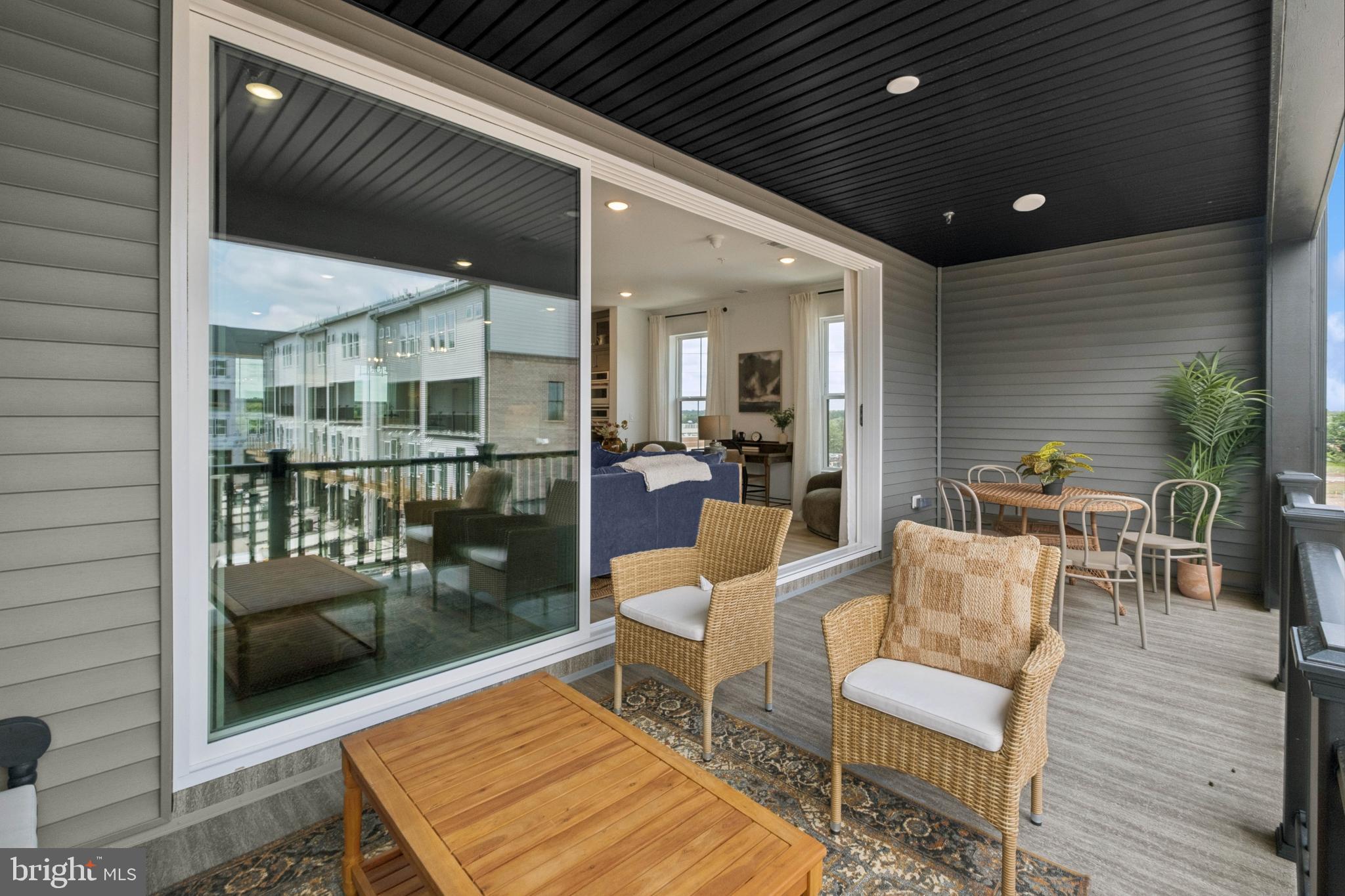 14962 Deco Circle Chantilly, VA 20151 - Photo 52 of 53 a outdoor space with patio lots of furniture and glass door